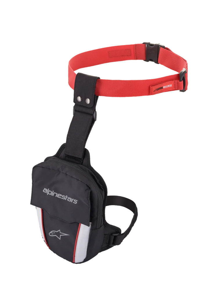 Alpinestars Access Thigh Bag, Motorcycle Thigh Bag, Black Red and White, featuring a red adjustable waist strap with quick-release buckle, black thigh strap, Alpinestars branding on the front flap, and reflective white panels with red accents for visibility.