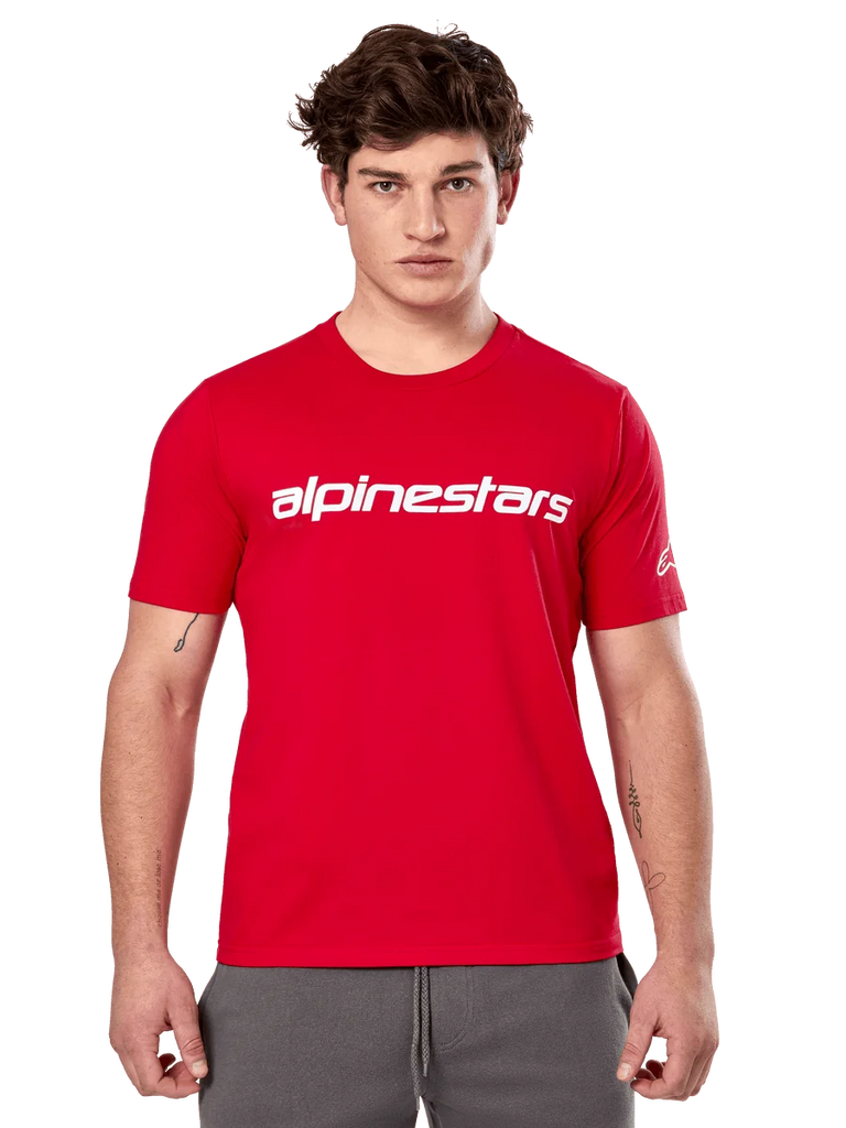 Alpinestars Linear Wordmark 2.0 CSF Tee, Short Sleeve T-Shirt, Red, White linear wordmark on chest and Ageless logo on sleeve, worn by male model with gray sweatpants, casual motorsport-inspired streetwear