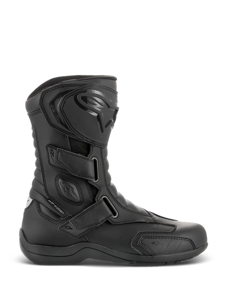 Alpinestars Radon Drystar® Boots, Black Waterproof Motorcycle Touring Boots, side profile view featuring three adjustable hook-and-loop straps, protective TPU shin plate with Alpinestars logo, reinforced ankle protection, and durable vulcanized sole.