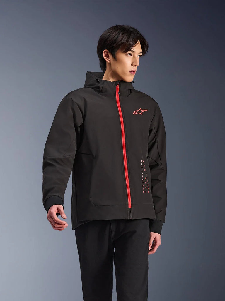 Alpinestars Radium Tech Hoodie, urban motorcycle jacket, Black with Bright Red zipper, featuring red Alpinestars logo on chest and red text on side, technical windproof shell with hood and ribbed cuffs, modern street style for riders