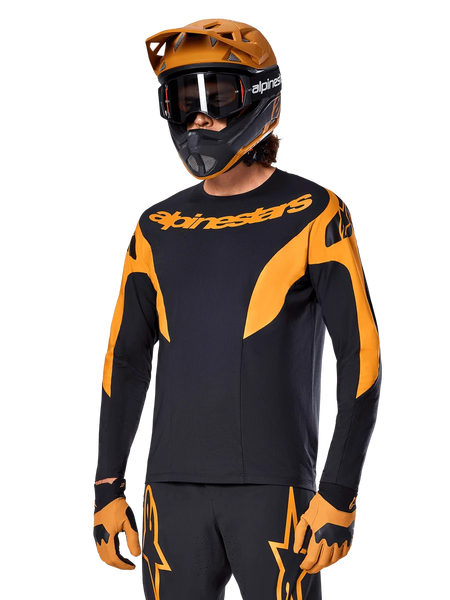 Alpinestars A-Supra Race Jersey - Long Sleeve, MTB Cycling Jersey, Black and Orange, worn with matching helmet and gloves, featuring Alpinestars branding on chest and stylized accents on sleeves, performance fit for off-road racing
