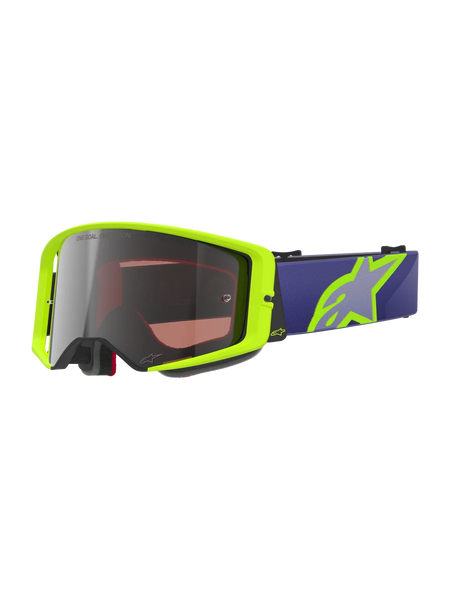 Alpinestars Supertech Vision Corp Goggles, Motocross Off-Road Goggles, Neon Yellow and Purple, silver mirrored lens with One Goal One Vision text, purple strap with large neon yellow star logo, black foam padding, high-impact curved lens design