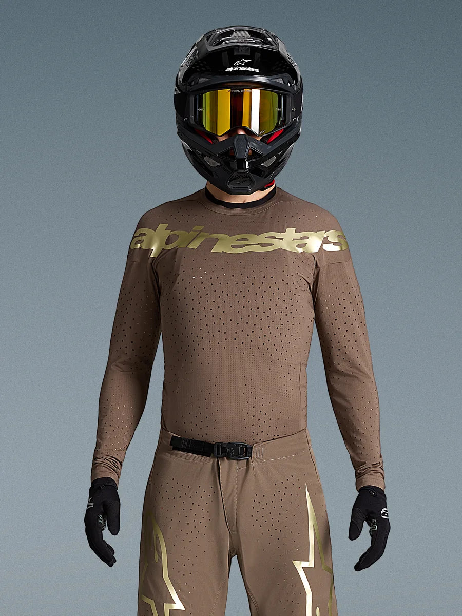 Alpinestars Limited Edition Supertech Air Gold Jersey, brown and gold motocross gear with laser-cut ventilation.