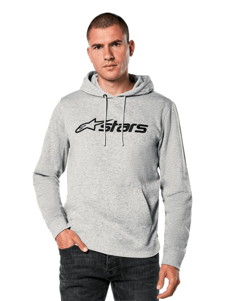Alpinestars Blaze V3 Hoodie, male model wearing light grey heathered pullover with black Astars chest logo, drawstring hood, front kangaroo pocket, casual motorsport-inspired streetwear