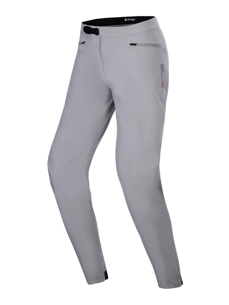 Alpinestars Stella A-Dura Waterproof Pant, Women's MTB Pants, Titanium Gray, featuring a black ratchet waist closure and zippered hand pockets, technical design with subtle branding, waterproof performance gear for cycling