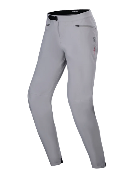 Alpinestars Stella A-Dura Waterproof Pant, Women's MTB Pants, Titanium Gray, featuring a black ratchet waist closure and zippered hand pockets, technical design with subtle branding, waterproof performance gear for cycling