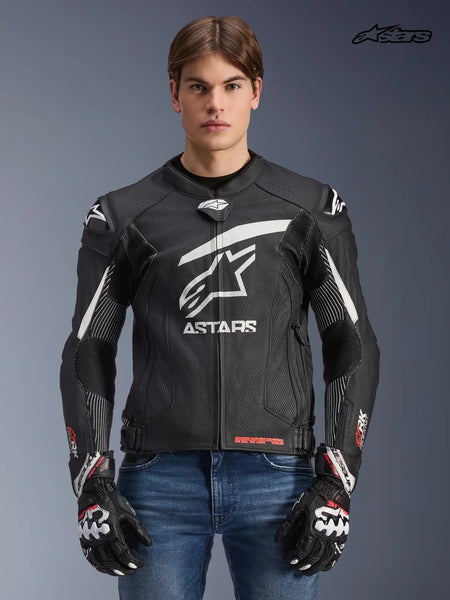 Alpinestars GP Plus R V4 Rideknit Leather Jacket, men's racing motorcycle jacket in black and white, front view on a model wearing matching gloves and jeans, race-derived protection and engineered stretch panels.