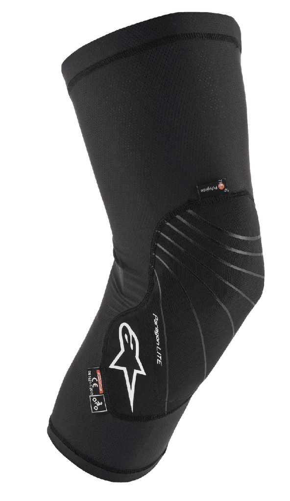 Alpinestars Paragon Lite Knee Protector, Black, lightweight protective gear with textured mesh construction, white logo, gray design lines, slip-on sleeve design, featuring CE Level 1 and Polygiene tags, designed for MTB and off-road cycling