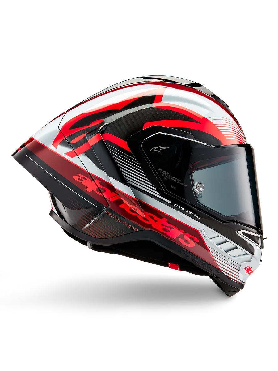 Alpinestars Supertech R10 Team Helmet, Motorcycle Racing Helmet, Black Carbon with Red and White Glossy Graphics, aerodynamic profile view featuring a dark visor, carbon fiber details, and bold red branding, high-performance racing gear