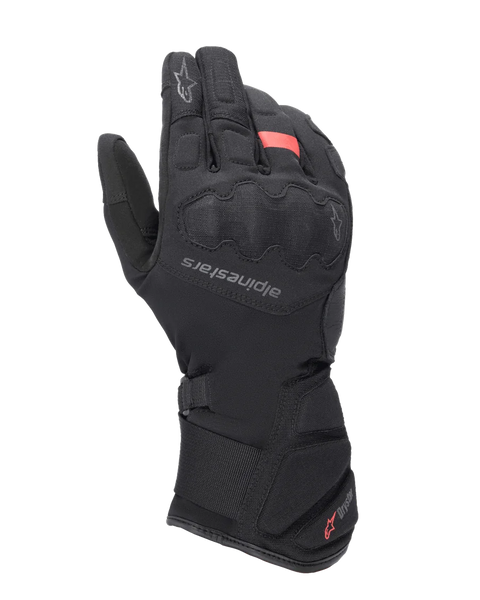 Alpinestars Tourer W-7 V2 Drystar Gloves, Winter Motorcycle Touring Gloves, Black with red accents, featuring reinforced knuckle protection, Alpinestars logo on the back of the hand, and a long adjustable cuff with Drystar branding