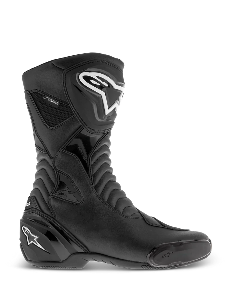 Alpinestars SMX S Waterproof Boots, Black motorcycle boots, side profile view featuring white logos on the shin and heel, textured accordion flex panels, durable microfiber construction, and waterproof branding, sleek sport-touring footwear