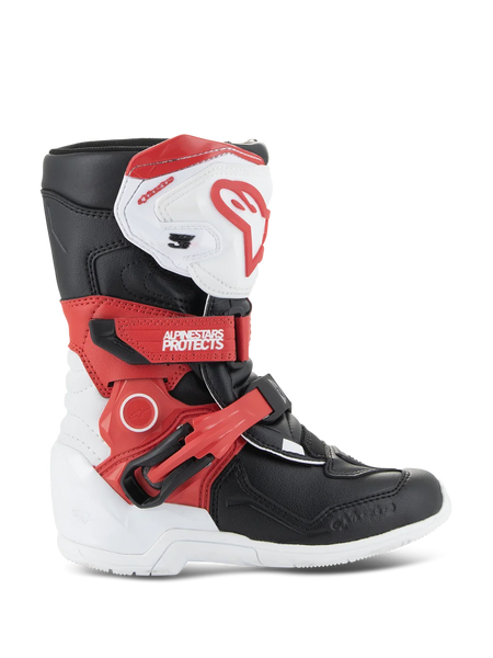Alpinestars Kids Tech 3S Boots, Youth Motocross Boots, White Black and Bright Red, featuring a high-ankle protective design, adjustable red straps, white shin plate with red logo, and a durable white outsole.