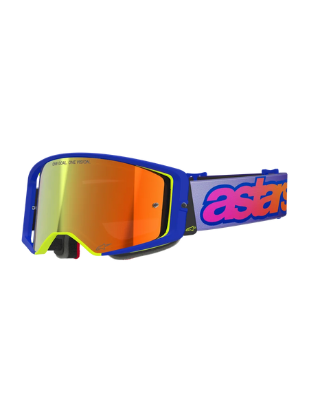 Alpinestars Supertech Vision Vista Goggles, Motocross Goggles, Blue frame with neon yellow accents, Orange-red mirrored lens, Light purple strap with pink and orange 'astars' branding, 'ONE GOAL. ONE VISION.' lens text