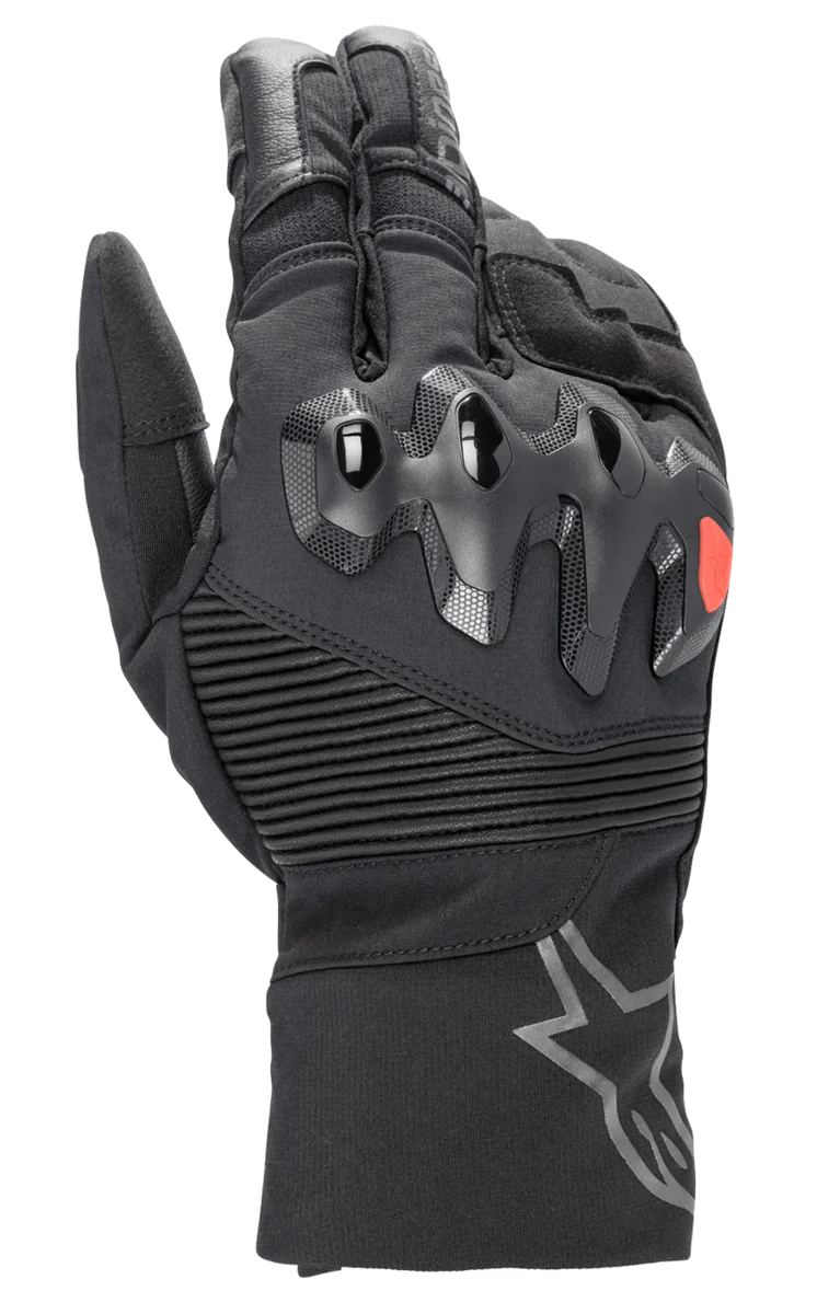 Alpinestars Bogota Drystar XF Gloves, full-length motorcycle touring gloves, black with a red logo accent, featuring over-injected knuckle protection, ribbed stretch wrist panels, and a long cuff with a grey star logo.
