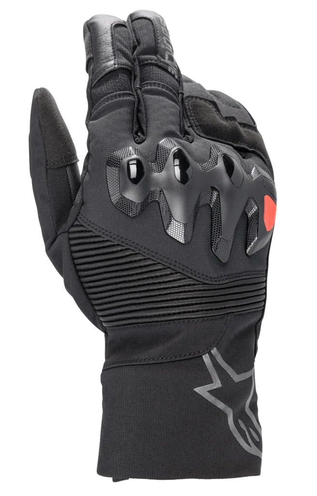 Alpinestars Bogota Drystar XF Gloves, full-length motorcycle touring gloves, black with a red logo accent, featuring over-injected knuckle protection, ribbed stretch wrist panels, and a long cuff with a grey star logo.