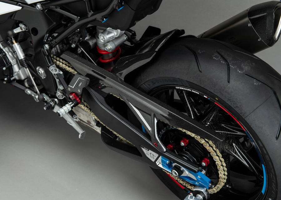 LighTech CARB1920 carbon rear mudguard and chain-cover section; installed view, rearsets, chain adjusters, wheel and other accessories not included.