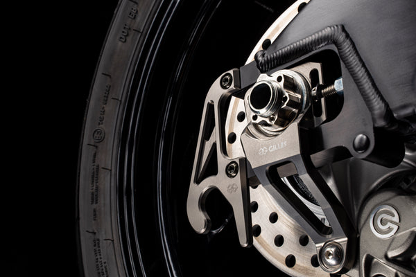 AXB chain tensioner and quick-change system