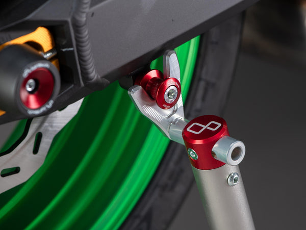 LighTech SCV005ROS swingarm paddock-stand spool installed, view 1; motorcycle, paddock stand, chain adjusters and axle protectors are not included.