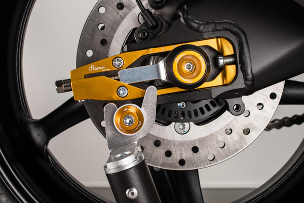 LighTech SCV003ORO swingarm paddock-stand spool installed, view 6; motorcycle, paddock stand, chain adjusters and axle protectors are not included.