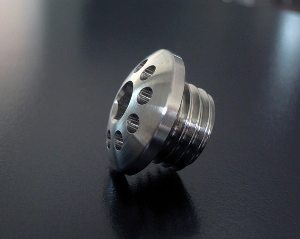 Titanium oil plug
