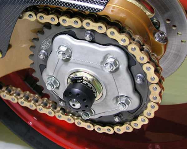 Rear wheel axle slider with titanium screws 1