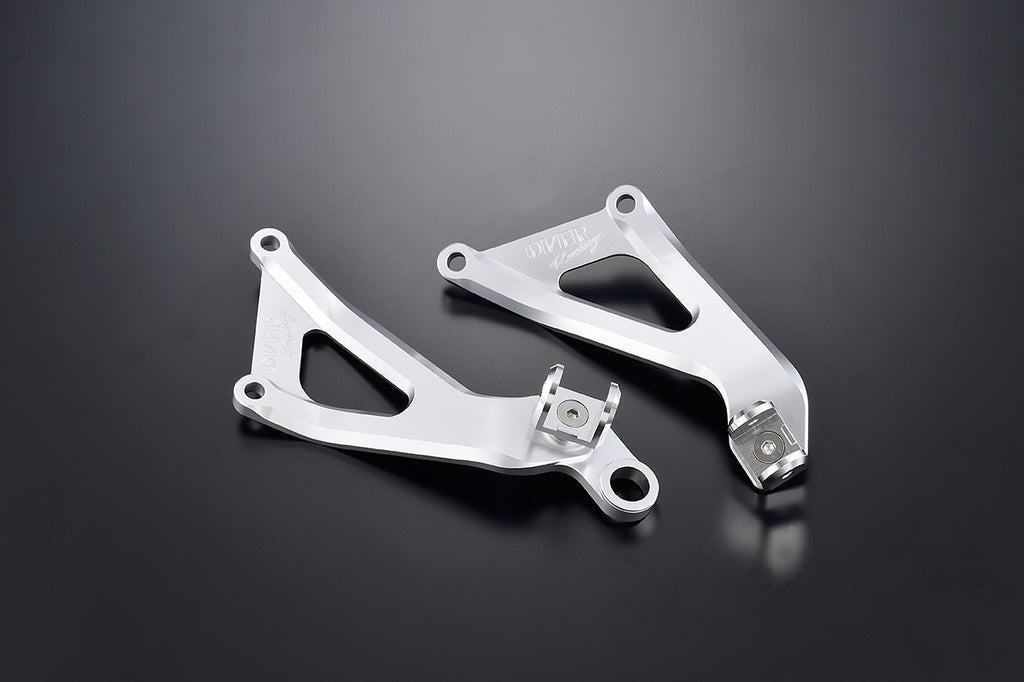 OVER Racing CNC Aluminum Exhaust / Passenger Footpeg Bracket Silver Ninja ZX-25R SE/ZX-4RR - image 1