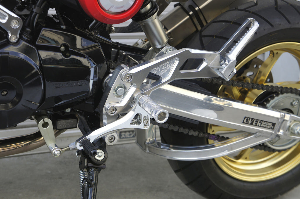 OVER Racing Rearset Kit 4-Position with Passenger Footpegs Black GROM (13-15) (16) (17-20) | 51-22-11B - image 1